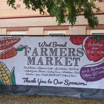 West Broad Farmers Market - two women standing in front of a banner - Farmers Market Near Me - Athens, Georgia West Broad Farmers Market - two women standing in front of a banner - Farmers Market Near Me - Athens, Georgia