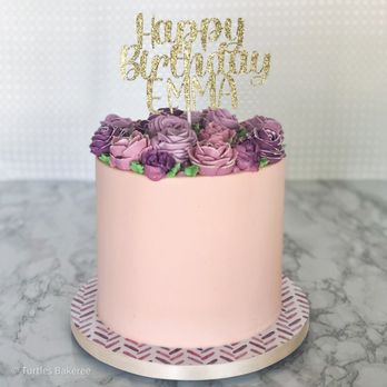 Turtles Bakeree - a pink birthday cake with purple flowers - Desserts Near Me