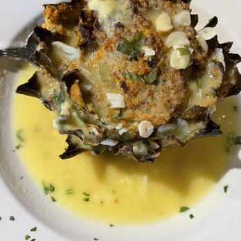 Nino's Italian Restaurant - Stuffed artichoke at Nino's - Italian Near Me - Delray Beach, Florida Nino's Italian Restaurant - Stuffed artichoke at Nino's - Italian Near Me - Delray Beach, Florida