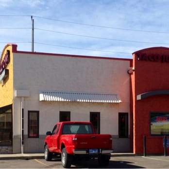 Taco John's - a red truck parked in front of a restaurant - Mexican Near Me - Mitchell, South Dakota