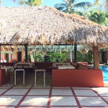 Hotel Villa de Arqueologicas - Restaurant surrounded by pool - Hotels Near Me - Chichén Itzá, YUC
