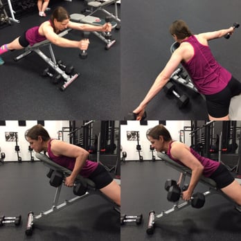 Sculpt Fitness - Going through a circuit of shoulder and back exercises with a Sculpt member Tonya. - Trainers Near Me - Akron, Ohio Sculpt Fitness - Going through a circuit of shoulder and back exercises with a Sculpt member Tonya. - Trainers Near Me - Akron, Ohio