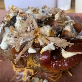 Creekside BBQ - Loaded baked potato with pulled pork - Barbeque Near Me - Pelham, Alabama Creekside BBQ - Loaded baked potato with pulled pork - Barbeque Near Me - Pelham, Alabama