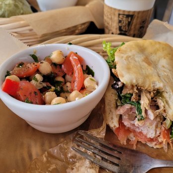 Saladelia Cafe & Catering - Chickpea salad and chicken shawarma (partially eaten) - Mediterranean Near Me - Durham, North Carolina Saladelia Cafe & Catering - Chickpea salad and chicken shawarma (partially eaten) - Mediterranean Near Me - Durham, North Carolina