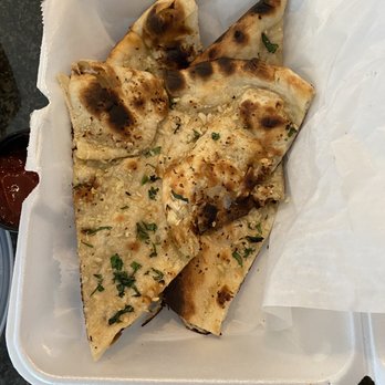 Ambrosia Zaika - Garlic cilantro naan (one piece missing) - Indian Near Me - North Attleborough, Massachusetts
