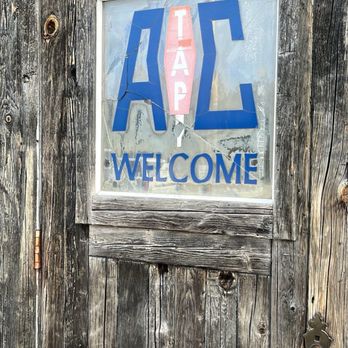 AC Tap - welcome door - American Near Me - Baileys Harbor, Wisconsin AC Tap - welcome door - American Near Me - Baileys Harbor, Wisconsin