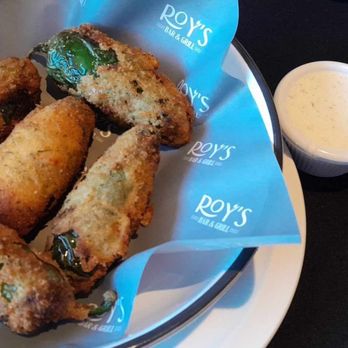 Roy's Bar and Grill - Stuffed fried jalopenis. If you love poppers, you got to try these. And they are huge. Get a side of ranch. - Bars Near Me - Carson City, Nevada Roy's Bar and Grill - Stuffed fried jalopenis. If you love poppers, you got to try these. And they are huge. Get a side of ranch. - Bars Near Me - Carson City, Nevada
