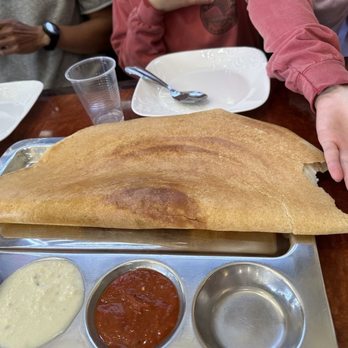 Tabla Indian Restaurant - Dosa using my hand as scale. Love the sauces! - Indian Near Me - San Mateo, California Tabla Indian Restaurant - Dosa using my hand as scale. Love the sauces! - Indian Near Me - San Mateo, California