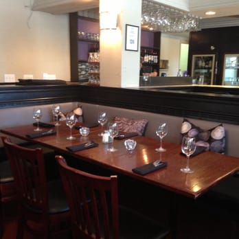 Resto Urban Dining - a long table with wine glasses on it - Desserts Near Me - Halifax, Nova Scotia Resto Urban Dining - a long table with wine glasses on it - Desserts Near Me - Halifax, Nova Scotia