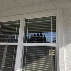 James Cooper Tree Service And Stump Grinding - Broken upper window pane.