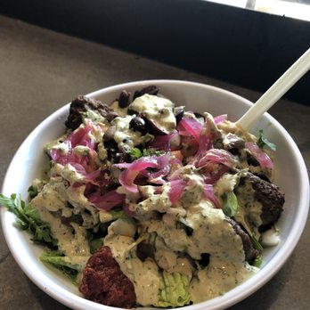 CAVA - Greens, hummus, harrisa, grilled beef meatballs, topping and lemon tahini dressing. Gluten-free and dairy-free and yummmmmie! - Mediterranean Near Me - Cary, North Carolina