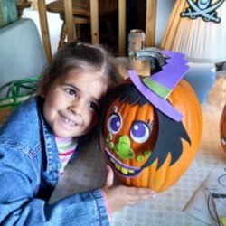 Sweet Minihaha Campground - Decorating pumpkins, she really loves her pumpkin.