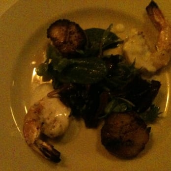Assaggio Ristorante - Prawn dipped in goat cheese paired with sea scallops. $12 - Italian Near Me - Seattle, Washington