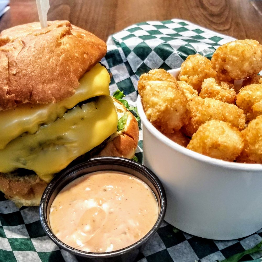 Wahlburgers - Double Decker w/ Tots and House Sauce - Burgers Near Me - Toronto, Ontario Wahlburgers - Double Decker w/ Tots and House Sauce - Burgers Near Me - Toronto, Ontario