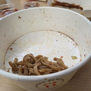 Bafang Dumpling - Sesame noodle with a fly at the bottom of the bowl. It was fully marinated in the noodle sauce. - Taiwanese Near Me - Van Nuys, California