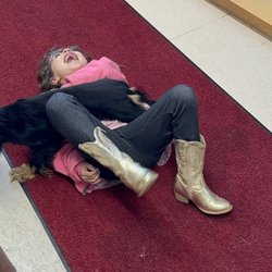 Puppy Love Grooming & Supplies - My daughter and Olivia (the owner/groomer's fur-baby) playing.