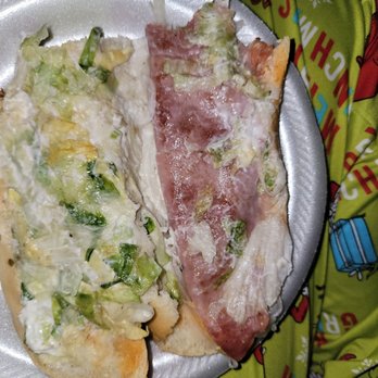 Cousins Subs - two slices of pizza on a paper plate - Sandwiches Near Me - Waukesha, Wisconsin Cousins Subs - two slices of pizza on a paper plate - Sandwiches Near Me - Waukesha, Wisconsin