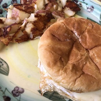 Ye Old Fort Diner - Egg and cheese on a hard roll with home fries - Diners Near Me - Fort Edward, New York Ye Old Fort Diner - Egg and cheese on a hard roll with home fries - Diners Near Me - Fort Edward, New York