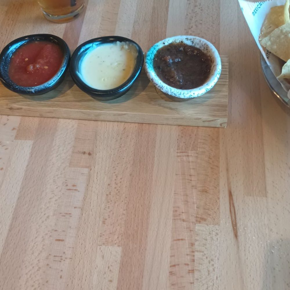 Frontera Mexican Kitchen - Salsa, cheese dip, chips, unsweet tea. The smoky brown salsa is my favorite! - Mexican Near Me - Buford, Georgia Frontera Mexican Kitchen - Salsa, cheese dip, chips, unsweet tea. The smoky brown salsa is my favorite! - Mexican Near Me - Buford, Georgia
