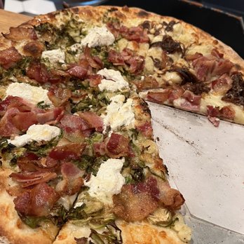 Next Door - Half Brussels sprouts, bacon, and ricotta half mashed potatoes, bacon and carmelized onions - Pizza Near Me - New Haven, Connecticut Next Door - Half Brussels sprouts, bacon, and ricotta half mashed potatoes, bacon and carmelized onions - Pizza Near Me - New Haven, Connecticut