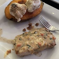 CJ's Kitchen - Mahi Mahi with delicate white wine cream sauce & baked sweet potato topped with butter & lightly browned marshmallows.