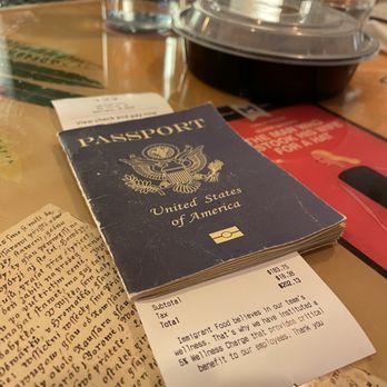 Immigrant Food - Of course a place that promotes the value, importance, and contributions made by immigrants --- will bring your bill in a passport. LOVE it! - New American Near Me - Washington, DC, District of Columbia
