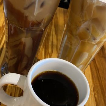 Toast 101 - Two iced coffee one mocha (left) one Carmel (right) both topped with caramel drizzle. And one hot coffee (in the middle in the mug haha) - Breakfast & Brunch Near Me - Tucson, Arizona Toast 101 - Two iced coffee one mocha (left) one Carmel (right) both topped with caramel drizzle. And one hot coffee (in the middle in the mug haha) - Breakfast & Brunch Near Me - Tucson, Arizona