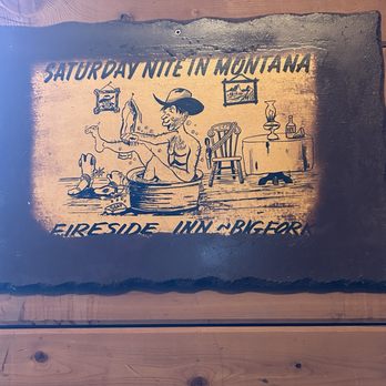 A Bar Montana - Great signs all around the bar. - Music Venues Near Me - Bigfork, Montana