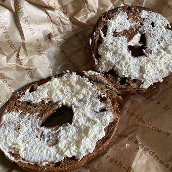 Einstein Bros. Bagels - 2nd bagel, another view -   A sad example of a toasted chocolate chip bagel with cream cheese - Breakfast & Brunch Near Me - Franklin, Tennessee