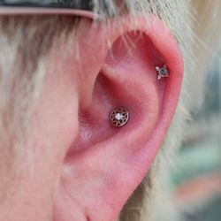 Enigma Professional Piercing Studio - Conch and helix piercings