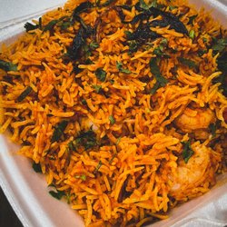Saffron Indian Bistro - Shrimp biryani in takeout container