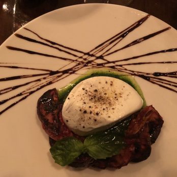Oliva Enoteca - BURRATA POMODORI Burrata, Roasted Tomatoes, Pesto Genovese, Balsamic Reduction, Sea Salt $220 - Italian Near Me - Mérida, YUC Oliva Enoteca - BURRATA POMODORI Burrata, Roasted Tomatoes, Pesto Genovese, Balsamic Reduction, Sea Salt $220 - Italian Near Me - Mérida, YUC