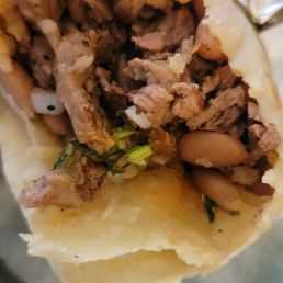 Asada burrito with easy rice and easy beans and no salsa Verde. Asada burrito with easy rice and easy beans and no salsa Verde.