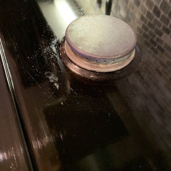 Mega Maid - This is after they "cleaned" my stove. - Home Cleaning Near Me - Huntington Beach, California