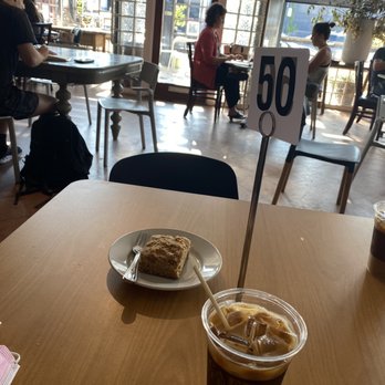 Cafe Stella - Iced coffee and walnut coffee cake - Coffee & Tea Near Me - Norfolk, Virginia Cafe Stella - Iced coffee and walnut coffee cake - Coffee & Tea Near Me - Norfolk, Virginia