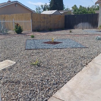 Sanchez Land Care - a gravel yard with a fire hydrant - Junk Removal & Hauling Near Me