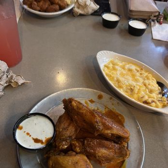 Pluckers Wing Bar - Linc - Spicy Lemon Pepper wings, all flats, wet. Mac n Cheese. Ranch. Background: Bites combo, Buffalo medium. With Waffle Fries. - Chicken Wings Near Me - Austin, Texas Pluckers Wing Bar - Linc - Spicy Lemon Pepper wings, all flats, wet. Mac n Cheese. Ranch. Background: Bites combo, Buffalo medium. With Waffle Fries. - Chicken Wings Near Me - Austin, Texas