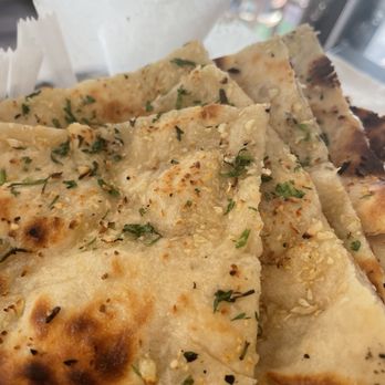 Paheli Indian Cuisine - Goat Cheese Naan and Garlic Naan - Indian Near Me - Wayne, New Jersey Paheli Indian Cuisine - Goat Cheese Naan and Garlic Naan - Indian Near Me - Wayne, New Jersey