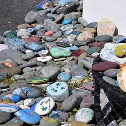 Ireland's Rustic Lodges - Painted  rocks around lighthouse