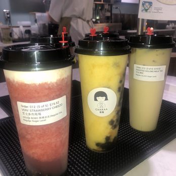 Chakaa Tea Cafe - Our 5 drinks for today's sampling. Very Strawberry Cheezo, Mango Yakult, & Roasted Oolong milk tea front & center - Bubble Tea Near Me - Thousand Oaks, California
