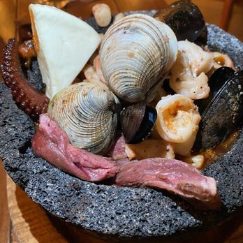 Santo Coyote Ocean Cantina - ALL IN ONE MOLCAJETE. Octopus, mussels, shrimp, beef and panela cheese with tomatillo sauce and dry mix chilli. - Mexican Near Me - Playa Encanto, SON Santo Coyote Ocean Cantina - ALL IN ONE MOLCAJETE. Octopus, mussels, shrimp, beef and panela cheese with tomatillo sauce and dry mix chilli. - Mexican Near Me - Playa Encanto, SON