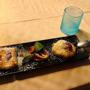 Cafe Sevilla - Lemon and custard empanadas with candied orange and berries. Delicious! - Spanish Near Me - Costa Mesa, California
