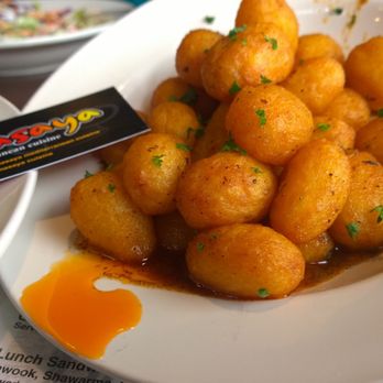 Masaya Mediterranean Cuisine - a plate of potatoes and meat - Mediterranean Near Me - Dearborn, Michigan Masaya Mediterranean Cuisine - a plate of potatoes and meat - Mediterranean Near Me - Dearborn, Michigan