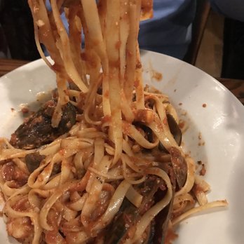 RigaTony's Authentic Italian - Capellini Pescatore with red sauce - Italian Near Me - Tempe, Arizona