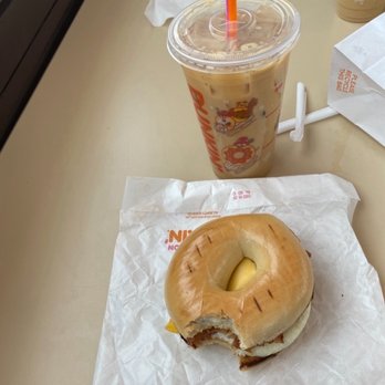 Dunkin' - Bacon Egg and Cheese on a Plain Stuffed Bagel with an iced coffee - Donuts Near Me - Fort Edward, New York Dunkin' - Bacon Egg and Cheese on a Plain Stuffed Bagel with an iced coffee - Donuts Near Me - Fort Edward, New York