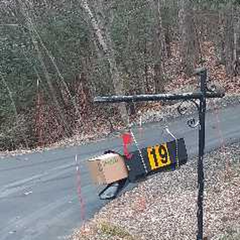 So, see anything wrong? 1) they can't leave package there, 2) the outgoing flag is up