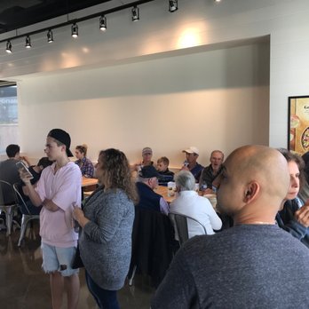 Freshii - a large group of people eating at a restaurant - Salad Near Me - Port Coquitlam, British Columbia