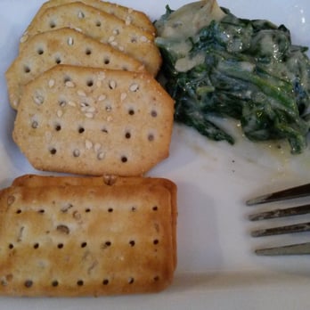 Frisco Tap House - Spinach & artichoke dip with crackers to keep the fat girl in me pacified as I wait for my entree. - American Near Me - Gambrills, Maryland