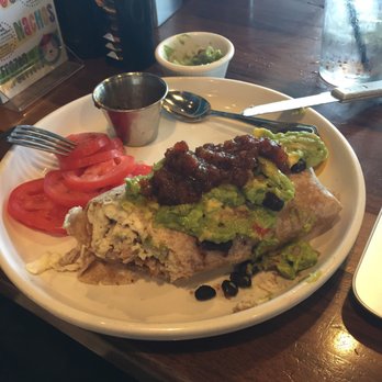Barnaby's Cafe - Annie's high protein breakfast burrito, loaded up with the salsa & guacamole - American Near Me - Houston, Texas
