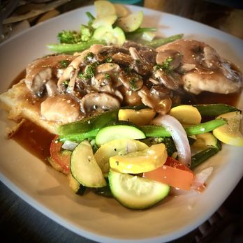 Bodega Biondi - Pollo Marsala... chicken breast strips with mushrooms, garlic, marsala wine and demi-glaze over creamy griddled polenta cakes - Wine Bars Near Me - Fair Oaks, California